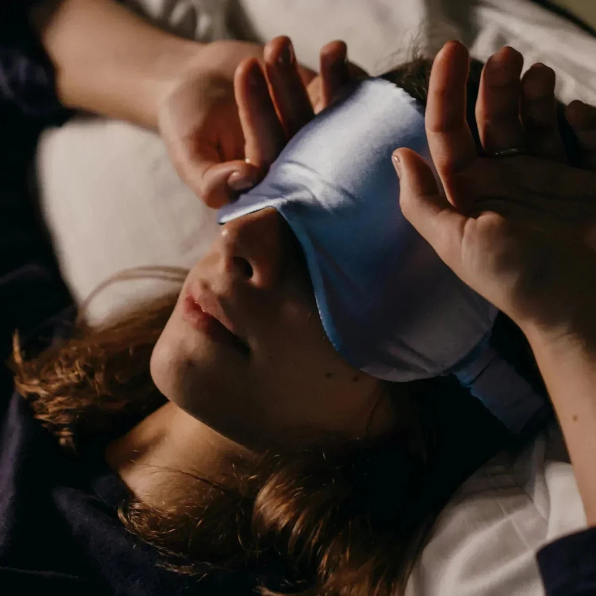 Woman with sleep mask